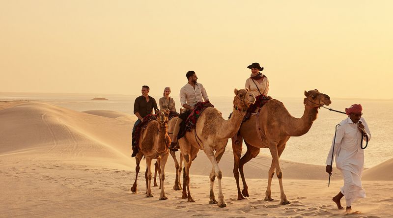 Camel ride in Khor Al Adaid